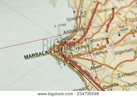 Marsala. The Island Of Sicily, Italy.  A Paper Map And Roads On The Map.