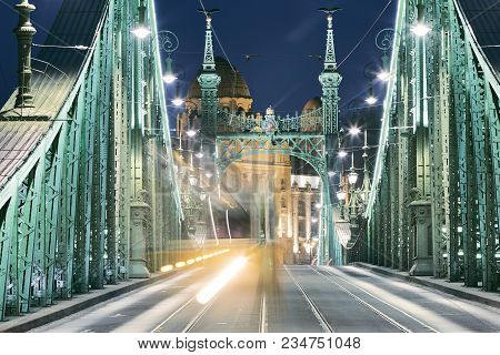 Budapest At Night. Tram On Old Iron Bridge - Szabadsag Hid (liberty Bridge).