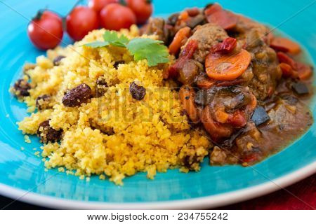 Kefta Tagine Moroccan Meatballs Served With Semolina and Vegetables 