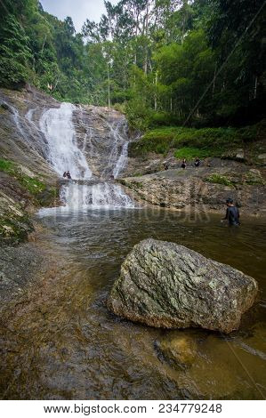 Lata Iskandar, Perak, Malaysia. March 25, 2018. A Lady Taking A Rest At A Lata Iskandar Waterfall, L