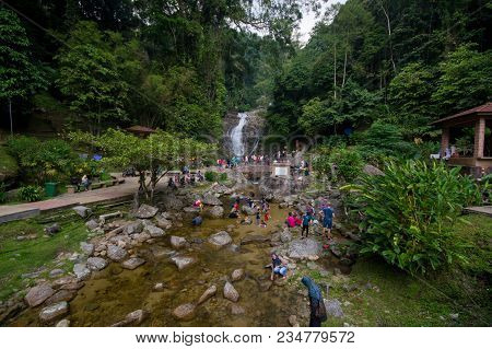 Lata Iskandar, Perak, Malaysia. March 25, 2018. A Lady Taking A Rest At A Lata Iskandar Waterfall, L
