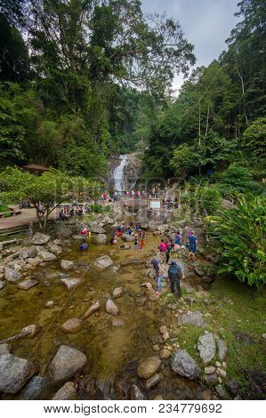 Lata Iskandar, Perak, Malaysia. March 25, 2018. A Lady Taking A Rest At A Lata Iskandar Waterfall, L