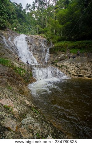 Lata Iskandar, Perak, Malaysia. March 25, 2018. A Lady Taking A Rest At A Lata Iskandar Waterfall, L