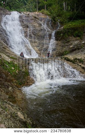 Lata Iskandar, Perak, Malaysia. March 25, 2018. A Lady Taking A Rest At A Lata Iskandar Waterfall, L