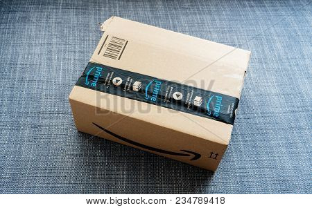 Paris, France - Mar 31, 2018: Cardboard Box With Amazon Prime Scotch Protection Band On Couch In Liv