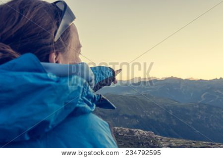Female Hiker Showing The Way. Exploring Brenta Dolomites, Italy.