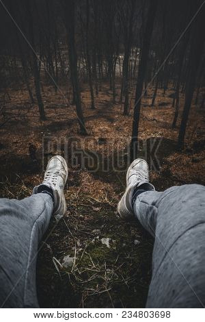 Man Resting On Perfect Scenic Overlook At Forest In Slovakia - Toned Photo. Man Relaxing And Enjoyin