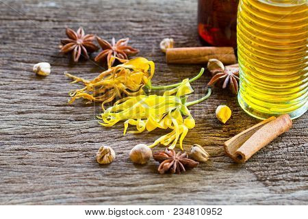 Yellow Thai Ylang-ylang Or Ilang-ilang Flower On Rustic Wooden Background