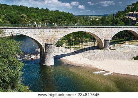 Stone Bridge Over The River Ardeche In France