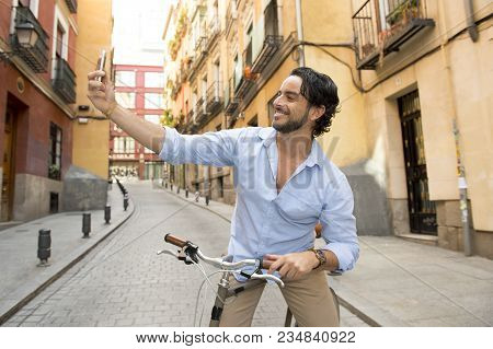Young Happy Attractive Hispanic Man In Casual Trendy Clothes Smiling Cheerful Using Mobile Phone On 
