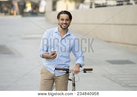 Young Happy Attractive Hispanic Man In Casual Trendy Clothes Smiling Cheerful Using Mobile Phone On 