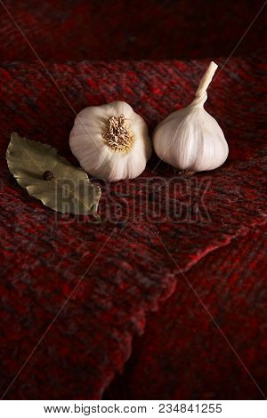 On The Red Textile, Seasonings: Garlic, Black Pepper Peas And Bay Leaf