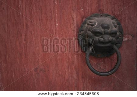 Red Door Handle Made Of Lion Head.