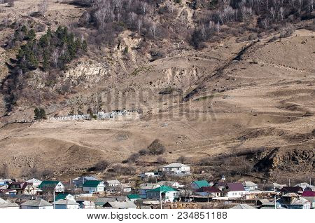 Old Cemetery In The Caucasus Mountains, Located On Top Of The Hill.