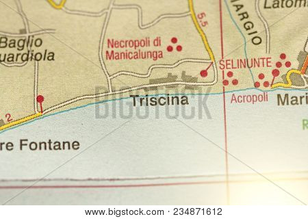 Triscina. The Island Of Sicily, Italy. A Paper Map And Roads On The Map.