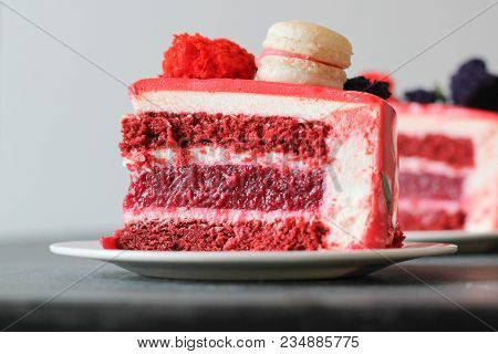 Red Velvet. Tasty Red Homemade Cake Decorated By Macarons. Modern Photo