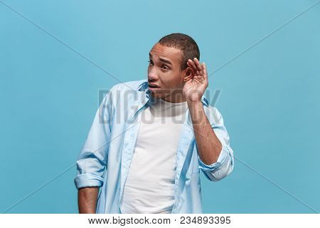 Secret, Gossip Concept. Young Man Whispering A Secret Behind His Hand. Afro Businessman Isolated On 