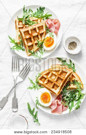 Served Breakfast With Potatoes Savory Waffles, Boiled Egg, Ham And Arugula On Light Background, Top 