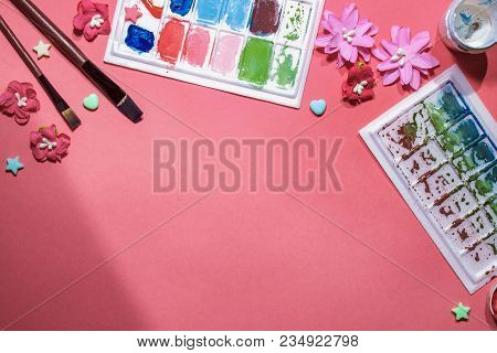 Color Gouache Jars On Pink Background. Top View, Copy Space