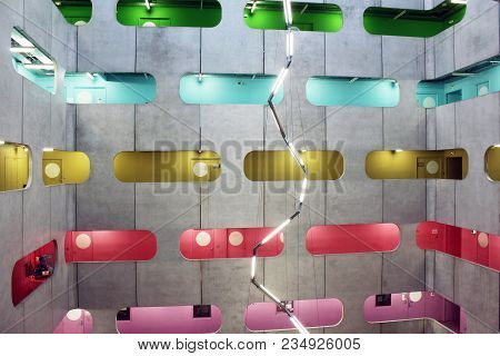 Industrial Atrium, Colorful Corridors On Different Levels And Zig Zag Light