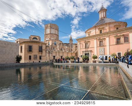 Valencia, Spain - March 16, 2018: Cathedral And Basilica With Reflection In Valencia In Spain