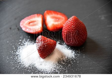 Strawberry With Crystal Sugar On Black Background Fruits