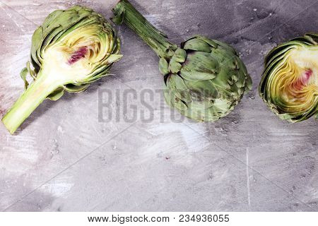 Artichokes On Grey Background. Fresh Organic Artichoke Flower.