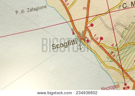 Scoglitti. The Island Of Sicily, Italy. A Paper Map And Roads On The Map.