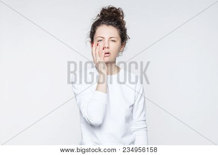 Tired Funny Female Student Being Fed Up With Studying, Covers Face, Does Not Want Hear Anything, Bei