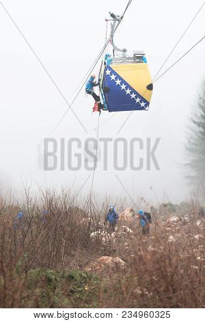 Alpinist Is Rescue People Exercise On Gondola Car