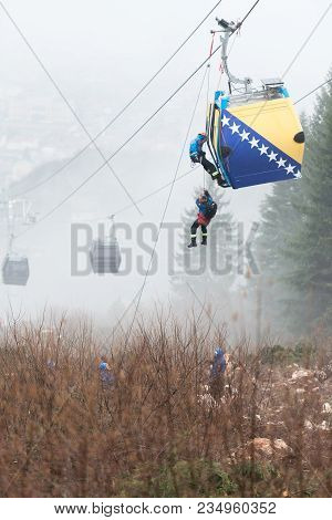 Alpinist Is Rescue People Exercise On Gondola Car