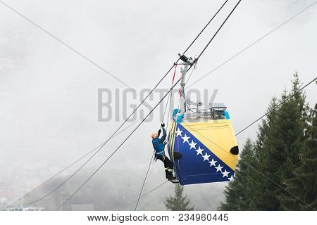 Alpinist Is Rescue People Exercise On Gondola Car