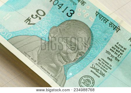 A New Banknote Of India With A Denomination Of 50 Rupees. Indian Currency. Portrait Of Mahatma Gandh