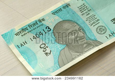 A New Banknote Of India With A Denomination Of 50 Rupees. Indian Currency. Portrait Of Mahatma Gandh