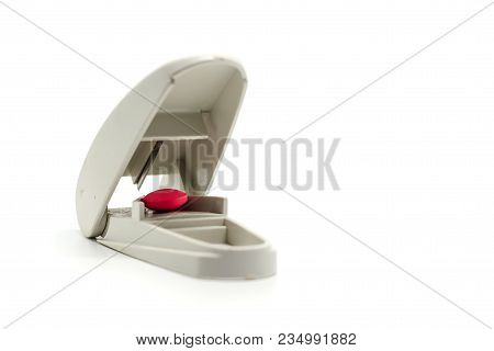 Pill Splitter On White Background For Healthcare And Medical Concept