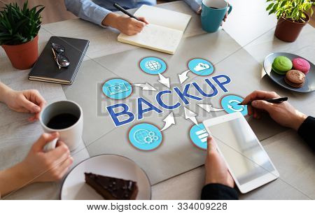 Backup User Data Security Recovery Internet Technology Concept On Office Desktop.