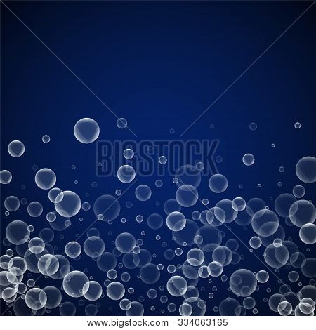 Random Soap Bubbles Abstract Background. Blowing Bubbles On Dark Blue Night Background. Bold Soapy F