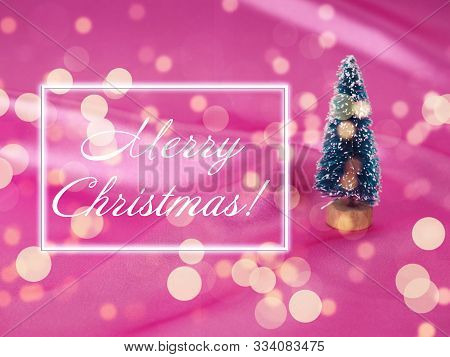 Christmas Tree On A Background Of Shiny Pink Satin As Background, Silk Background, Christmas Card. H