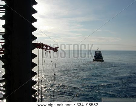 Supply Vessel Heading Home After Delivery Of Crew And Supplies To Offshore Rig In Malaysia.