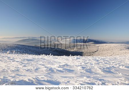 Winter Trail In Jeseniky Mountains In Czechia During Nice Winter Day With Clear Sky. Wiew Of Praded 