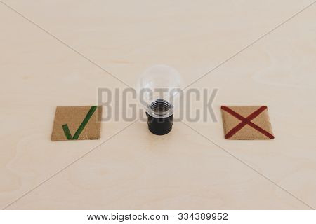 Feedback About Good And Bad Ideas, Lightbulb With Green Tick And Red Cross
