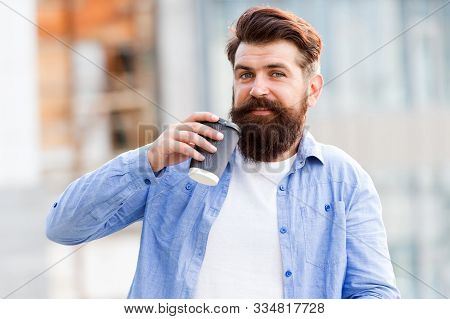 Few More Sips. Bearded Man Enjoy Drinking Coffee Outdoor. Hipster Hold Takeaway Hot Beverage Cup. Dr