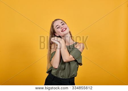 Young Beautiful Blonde Woman Wearing Haki Shirt Looks Happy And Excited Doing Winner Gesture Keeping