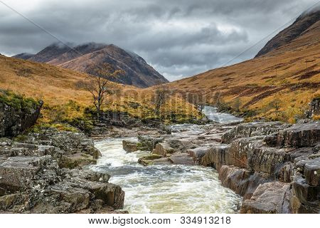 The Fast Flowing White Water Of River Etive In The Scottish Highlands