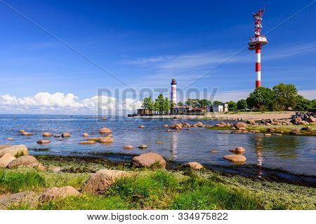 Shepelevsky Lighthouse On The Picturesque Coast Of The Gulf Of Finland. Beautiful Summer View Of The