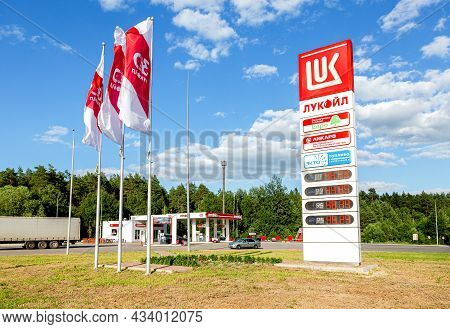 Mordovia, Russia - July 6, 2021: Lukoil Gas Station With Fueling Cars. Lukoil Is One Of The Largest 