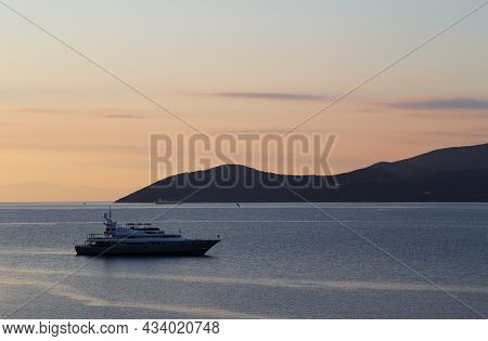 Luxury Yacht Entering Agia Efimia Bay Early Morning, Cephalonia Island, Greece. Sunrise At Greek Isl