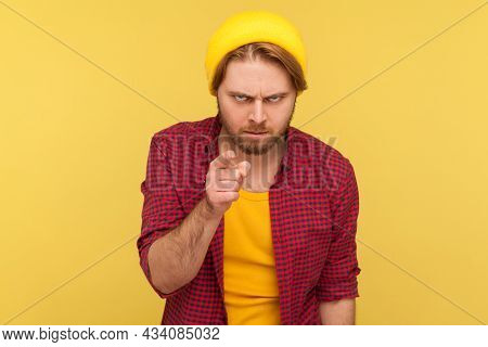 Hey You, Be Careful. Strict Hipster Bearded Guy In Beanie Hat And Checkered Shirt Pointing To Camera