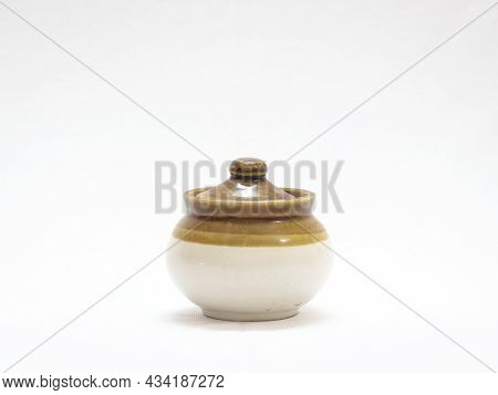 Traditional Antique Jar Used To Store Food Isolated In A White Background