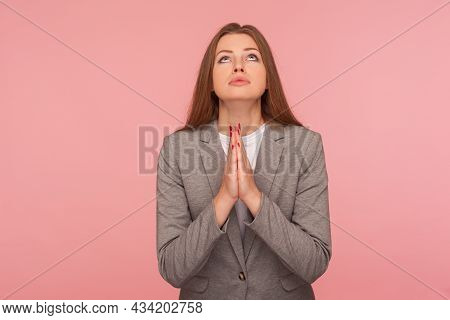 Please, God Help. Portrait Of Imploring Young Woman In Business Suit Looking Up And Praying, Begging